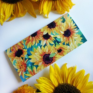 rahakaart päevalillede akvarellmaaliga koos päris päevalilleõitega